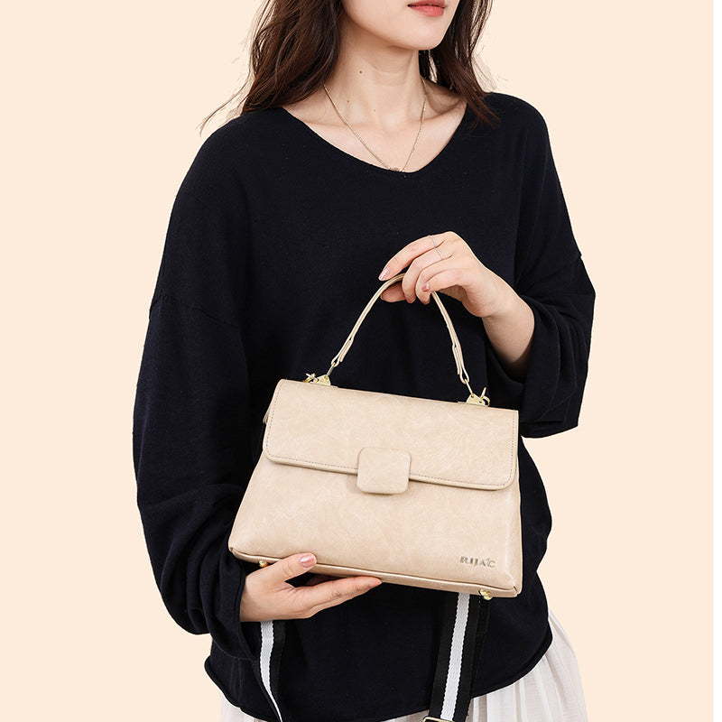 White Tavi 2 Compartment Flap Sling Bag