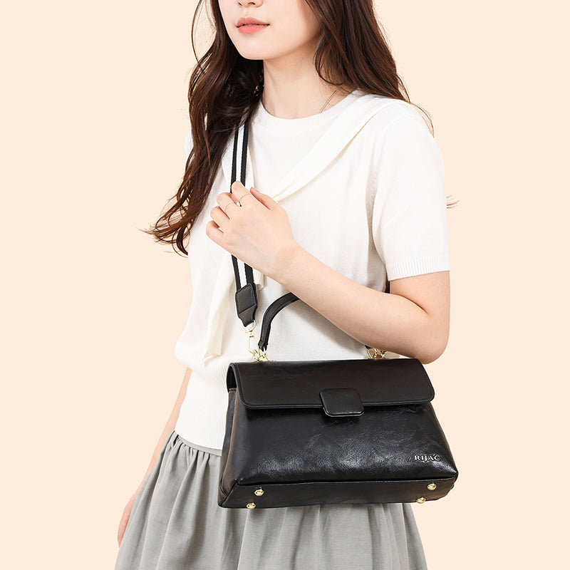 Black Tavi 2 Compartment Flap Sling Bag