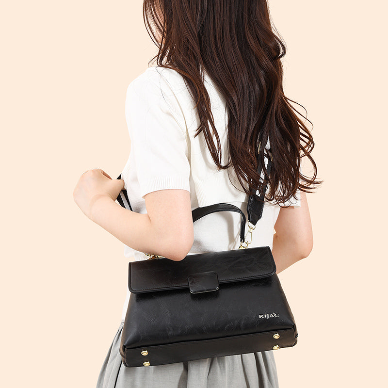 Black Tavi 2 Compartment Flap Sling Bag