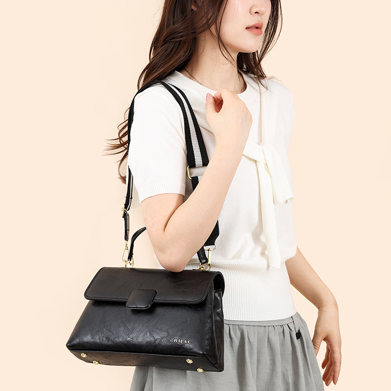 Black Tavi 2 Compartment Flap Sling Bag