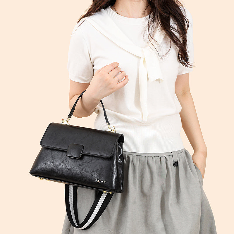 Black Tavi 2 Compartment Flap Sling Bag
